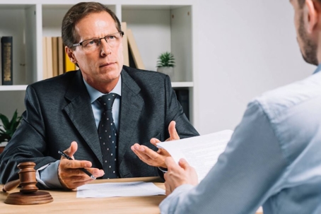 Lawyer discussing with client
